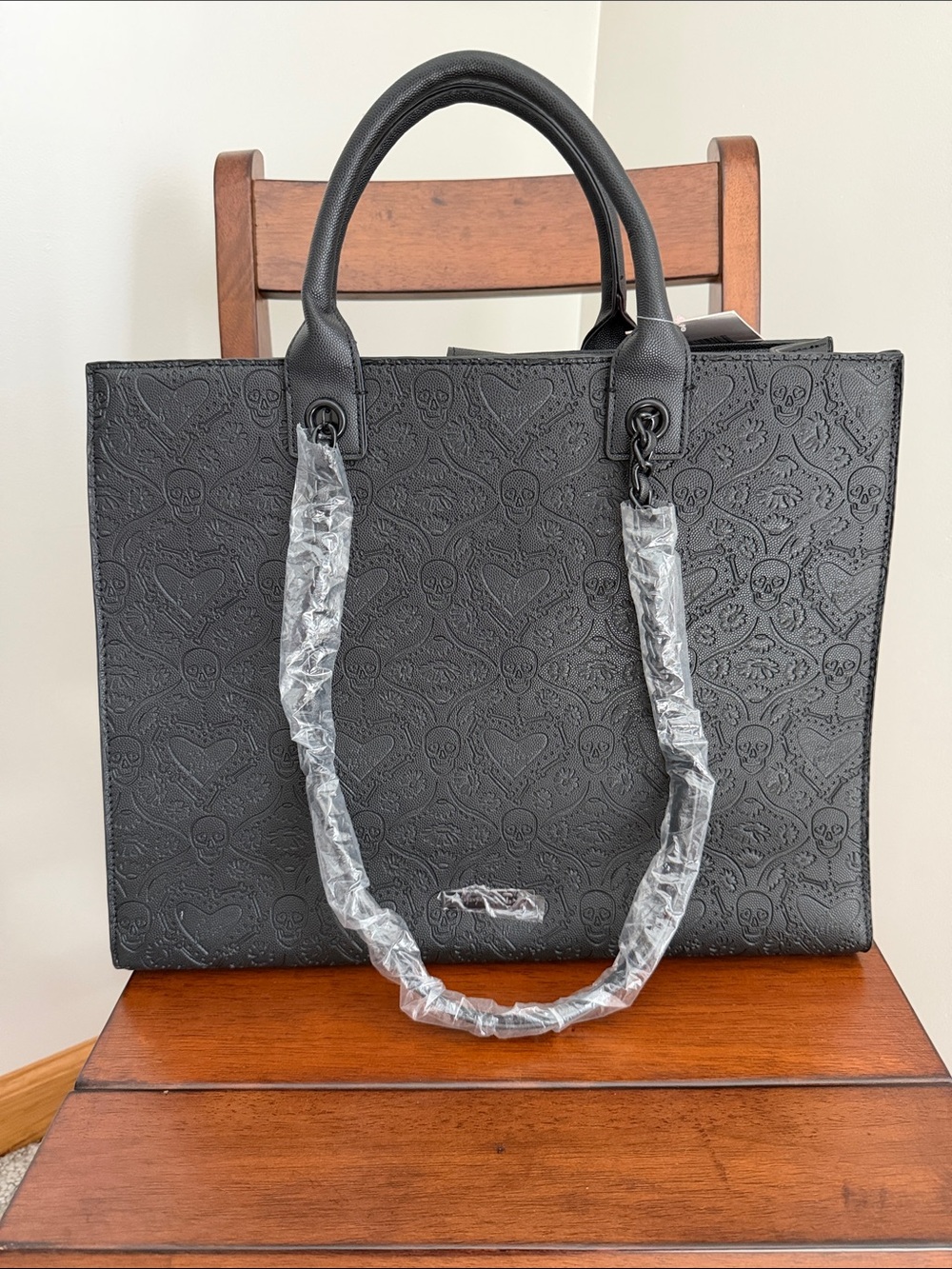 Betsey Johnson Black Embossed Skull Tote with Chain-Strap Accents - Picture 2 of 7